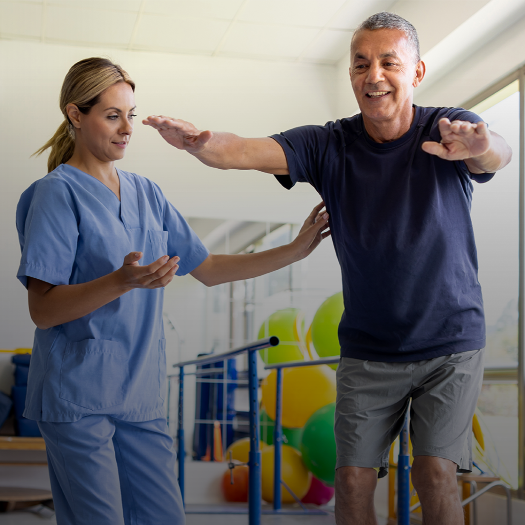 HSS Nurse helps patient retain balance while exercising