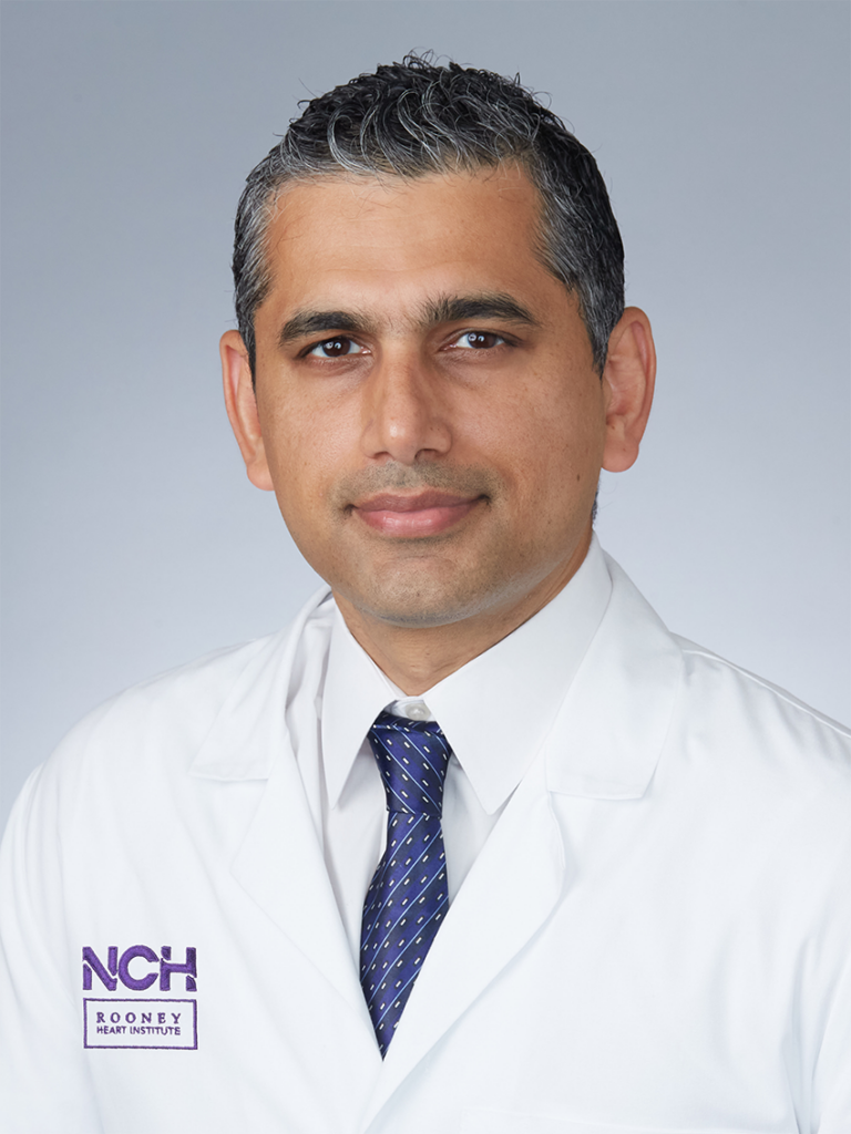 Headshot of Dinesh Sharma