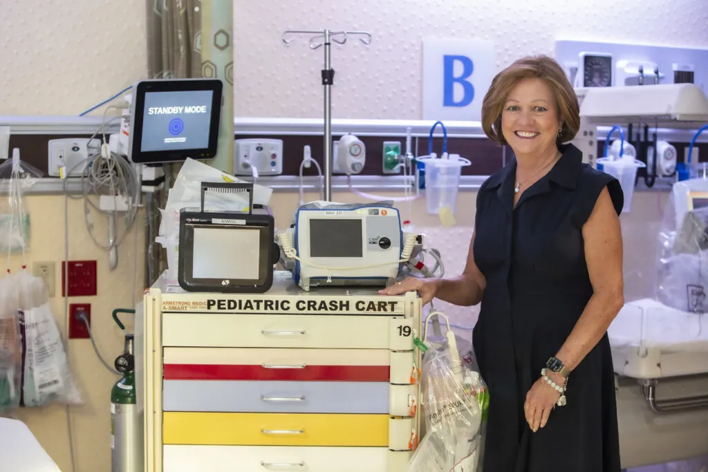 Photo of Julia Van Domenlen posing with ER Equipment